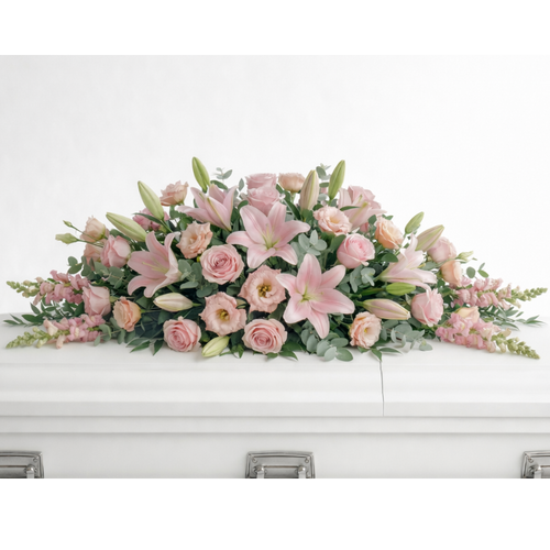 Blush Tribute Casket Flowers - Pink roses, lilies and snapdragons casket arrangement